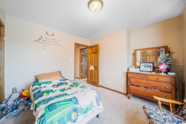 bedroom featuring light carpet