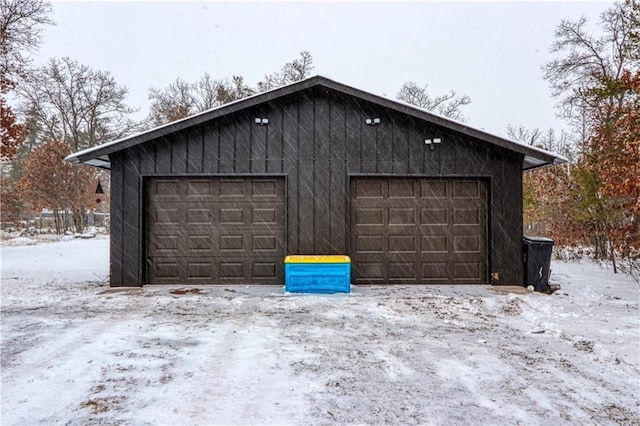 view of snow covered garage