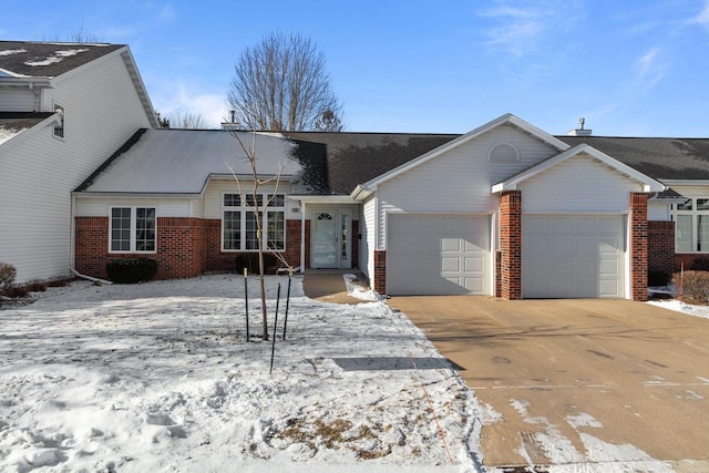 single story home with a garage