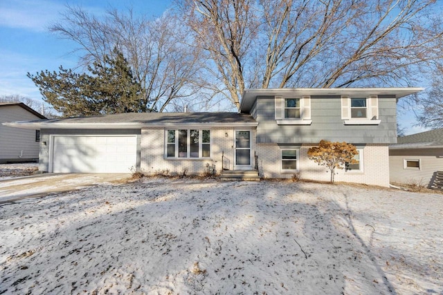 split level home featuring a garage