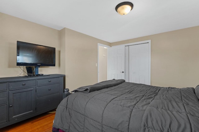 bedroom with light hardwood / wood-style floors