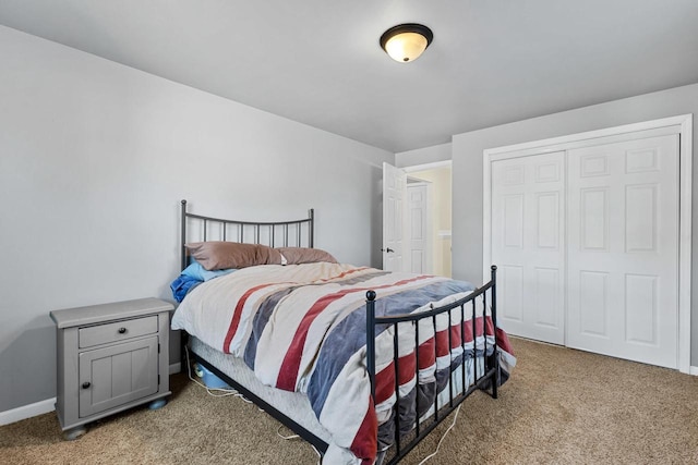 carpeted bedroom with a closet