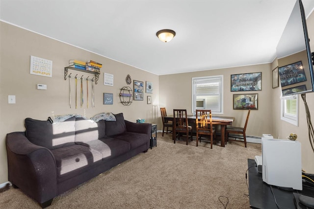 carpeted living room featuring a baseboard heating unit