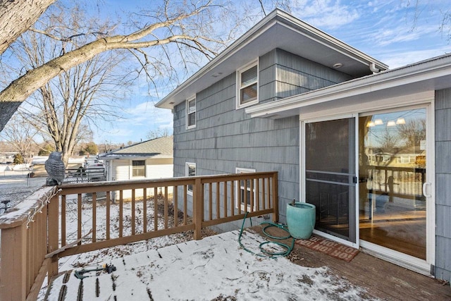 view of snow covered deck