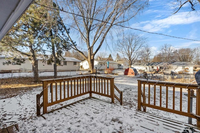 view of snow covered deck