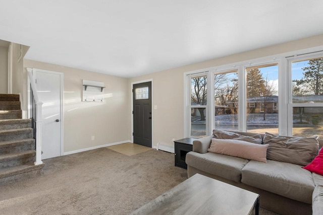 carpeted living room with a baseboard radiator