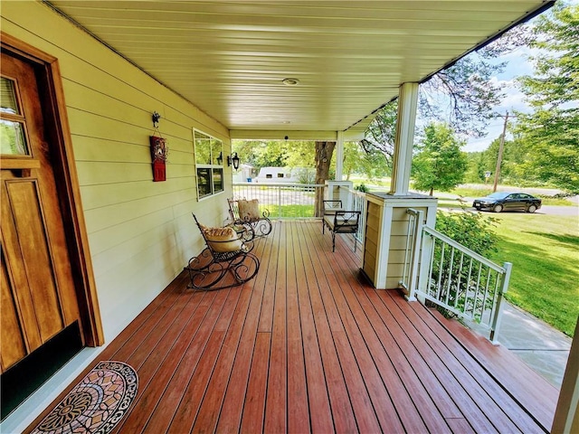 wooden deck with a porch