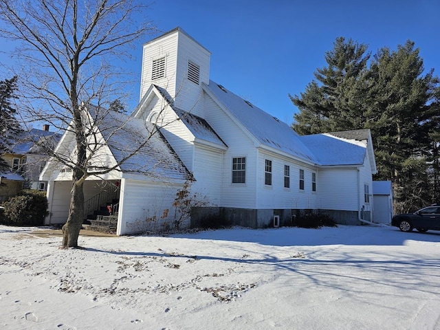 view of snow covered property