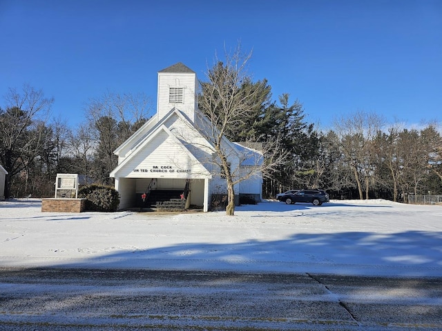 view of snow covered property