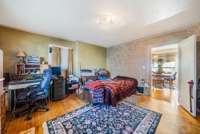 bedroom featuring wood-type flooring