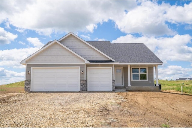 craftsman house with a garage