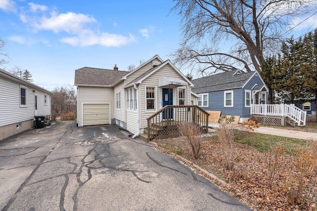 bungalow-style house with a garage