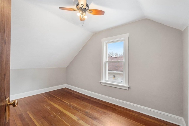 bonus room with lofted ceiling, ceiling fan, and hardwood / wood-style flooring