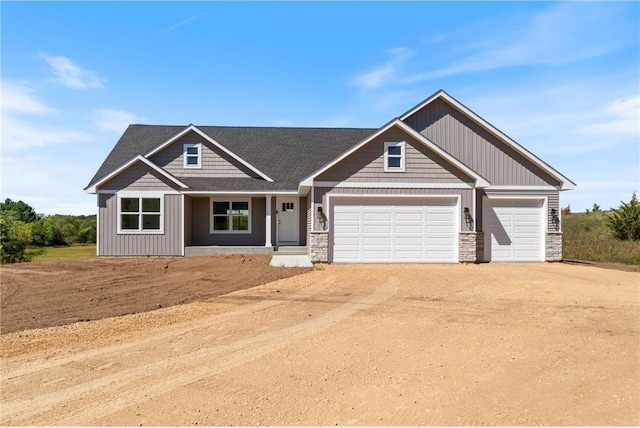 craftsman-style home with a garage