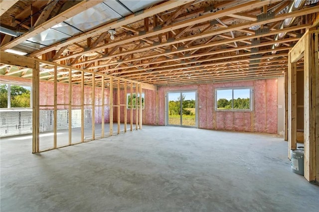 misc room with concrete flooring