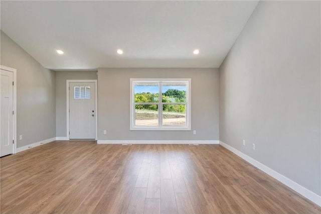 entrance foyer with light hardwood / wood-style flooring