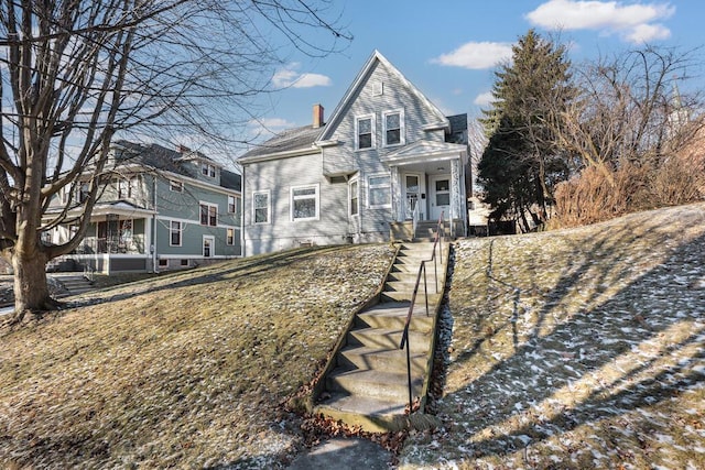 view of property with a front lawn