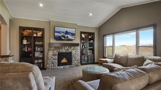 E5695 510th Ave, Menomonie, WI 54751 - living room with vaulted ceiling, carpet floors, built in shelves, and a fireplace