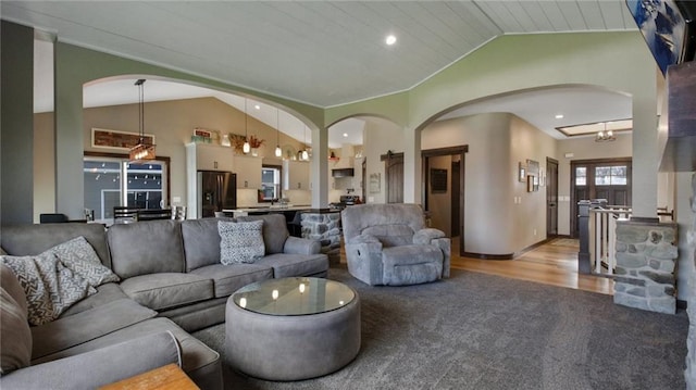 E5695 510th Ave, Menomonie, WI 54751 - carpeted living room with a notable chandelier, vaulted ceiling, and wooden ceiling