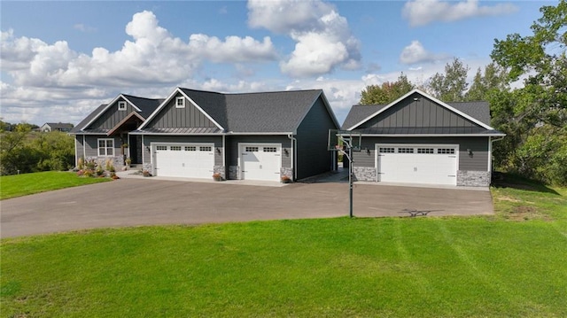 craftsman-style house with a front lawn and a garage