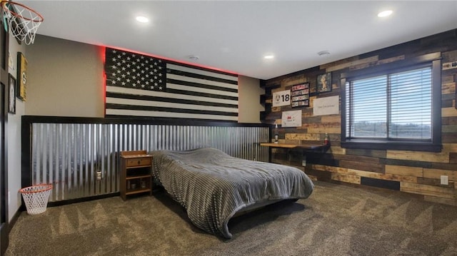 E5695 510th Ave, Menomonie, WI 54751 - bedroom featuring dark colored carpet and wooden walls