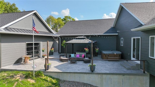 E5695 510th Ave, Menomonie, WI 54751 - back of property with a gazebo, a patio area, a hot tub, and outdoor lounge area