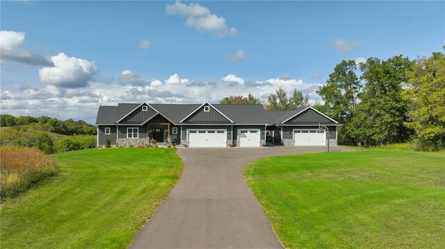 E5695 510th Ave, Menomonie, WI 54751 - view of front of house with a front yard and a garage