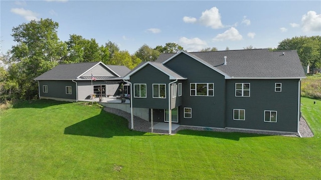 E5695 510th Ave, Menomonie, WI 54751 - back of house with a lawn and a patio area