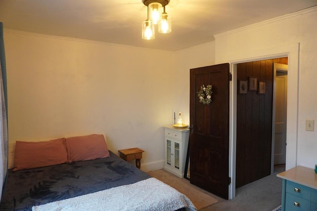 bedroom featuring ornamental molding and light colored carpet