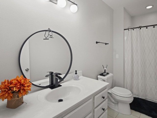 bathroom featuring a shower with shower curtain, tile patterned flooring, vanity, and toilet