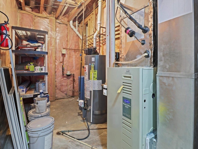 utility room featuring gas water heater