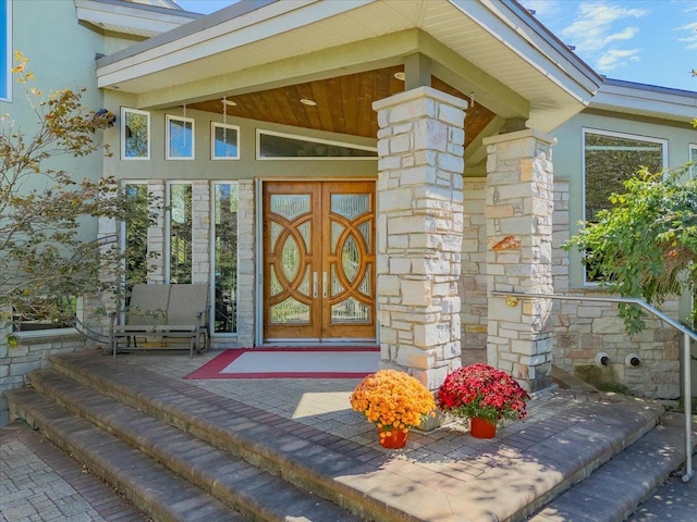 doorway to property featuring french doors