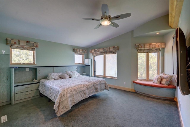 carpeted bedroom featuring ceiling fan and vaulted ceiling