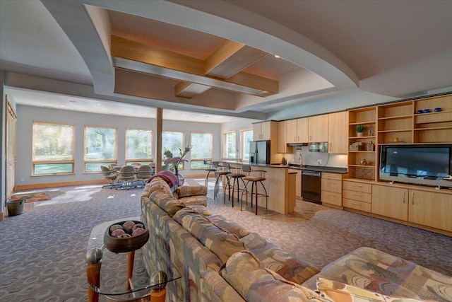 living room featuring coffered ceiling, beamed ceiling, and carpet flooring