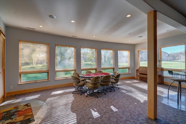 sunroom featuring a healthy amount of sunlight