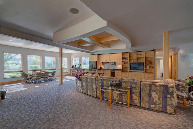 living room with light colored carpet, beam ceiling, and coffered ceiling