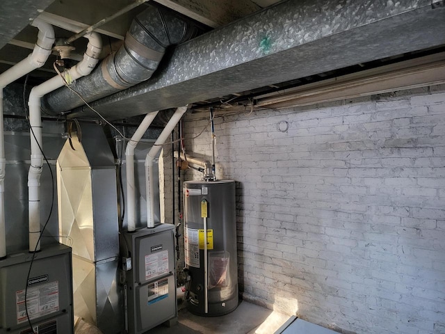 utility room featuring water heater