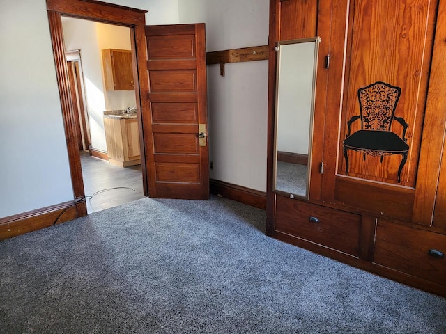 unfurnished bedroom with light colored carpet