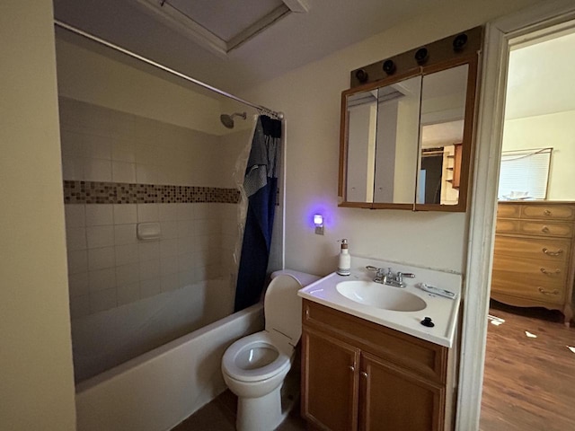 full bathroom featuring toilet, shower / tub combo with curtain, vanity, and wood-type flooring