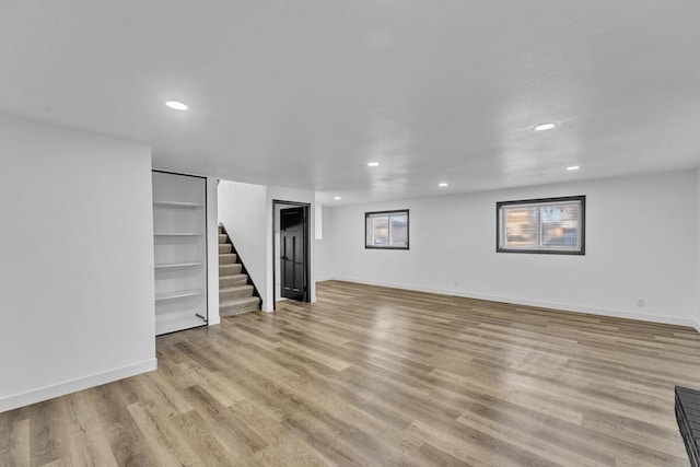 basement with light wood-type flooring