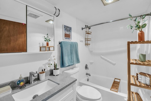 full bathroom featuring bathtub / shower combination, vanity, and toilet