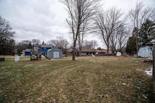 view of yard with a storage shed