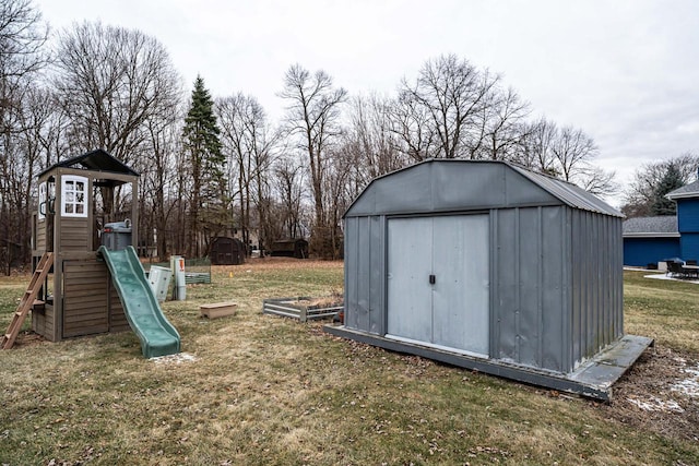 view of outbuilding featuring a yard and a playground