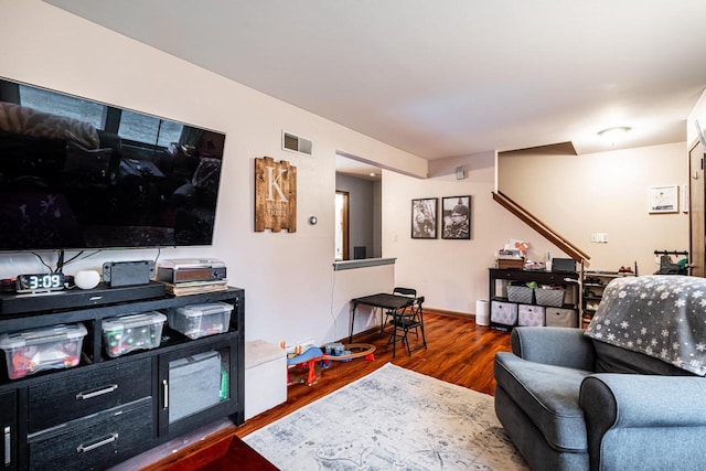 living room featuring dark hardwood / wood-style floors