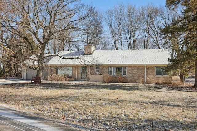 single story home with a garage