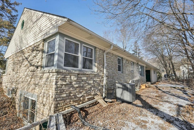 view of home's exterior featuring central air condition unit