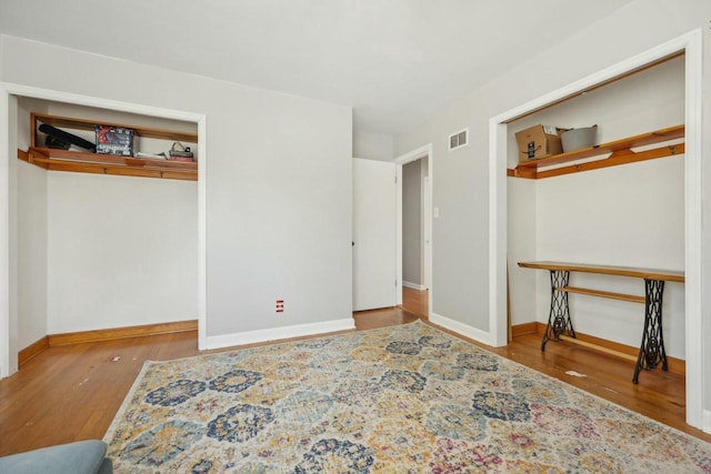 bedroom featuring wood-type flooring