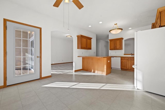 kitchen with ceiling fan and white appliances