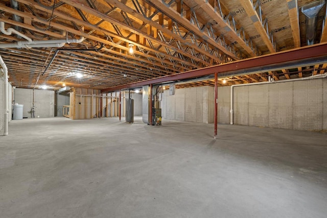 basement with heating unit and gas water heater