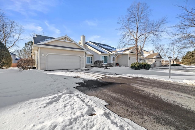 single story home with a garage